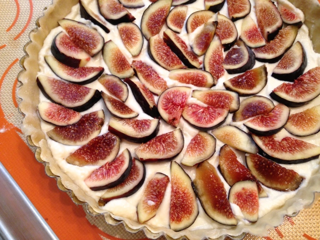 figs placed in ricotta